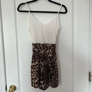 Cheetah print romper in a size medium for sale from &merci
